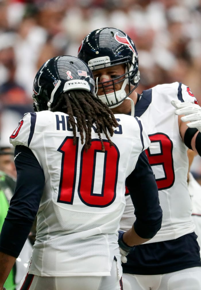 DeAndre Hopkins (10) and J.J. Watt celebrate after a touchdown during a 2016 game against the Bears. Both are among the greatest players in Texans history.